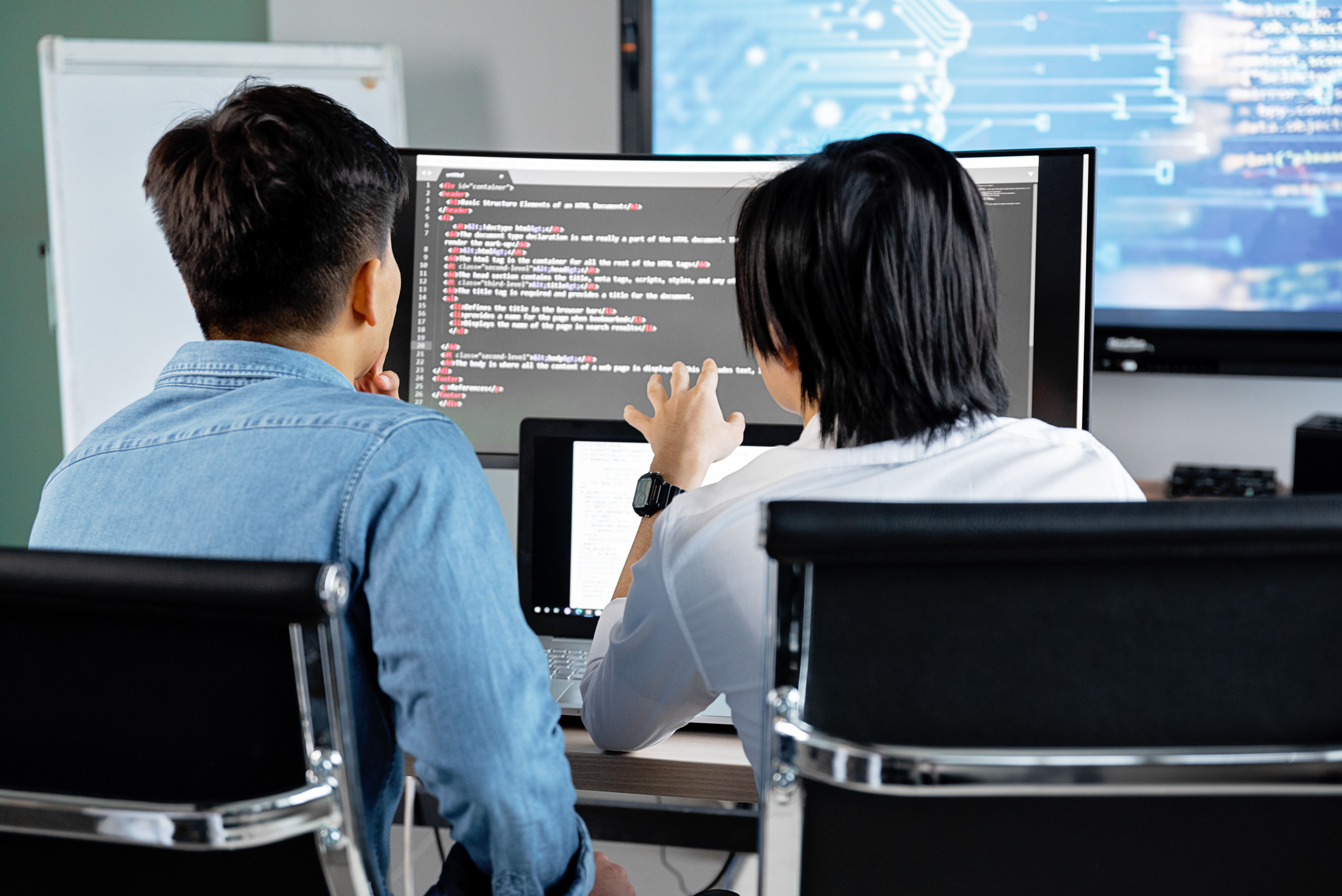 Software developers collaborating
